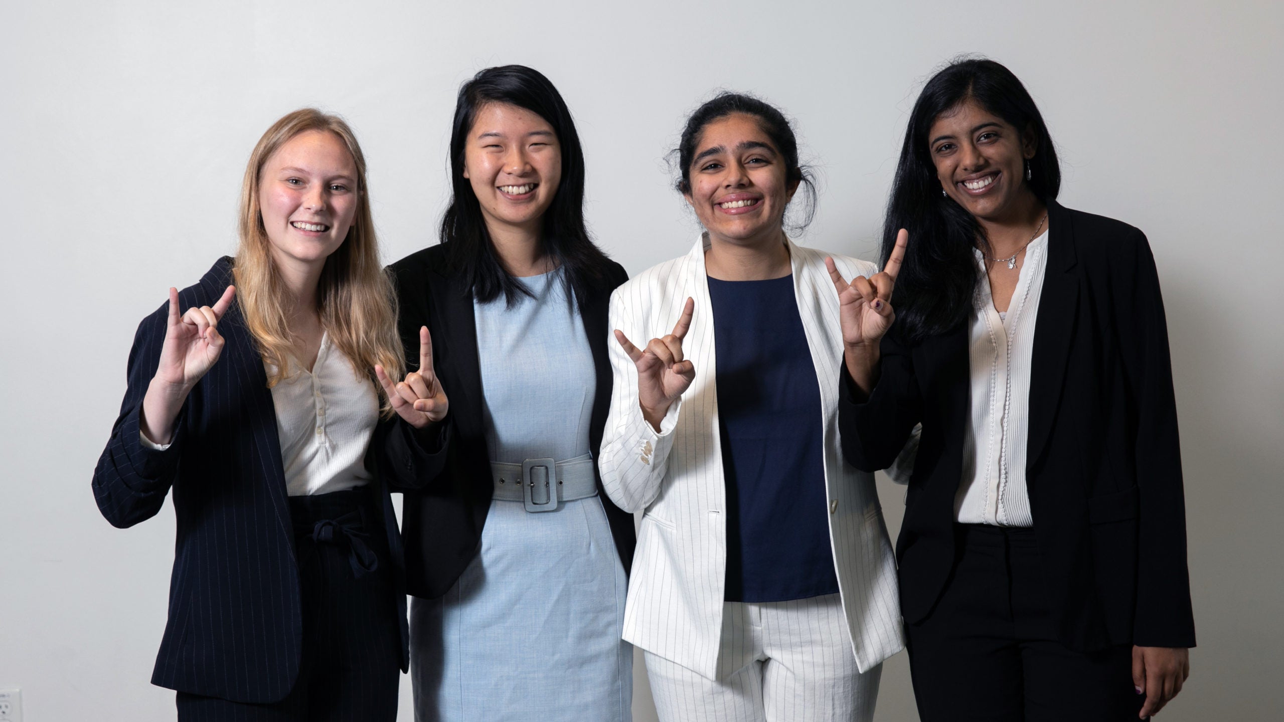 Rosaleen poses with her team after they pitched their research project