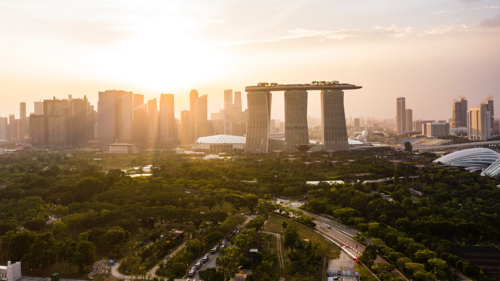 a view of singapore at sunset