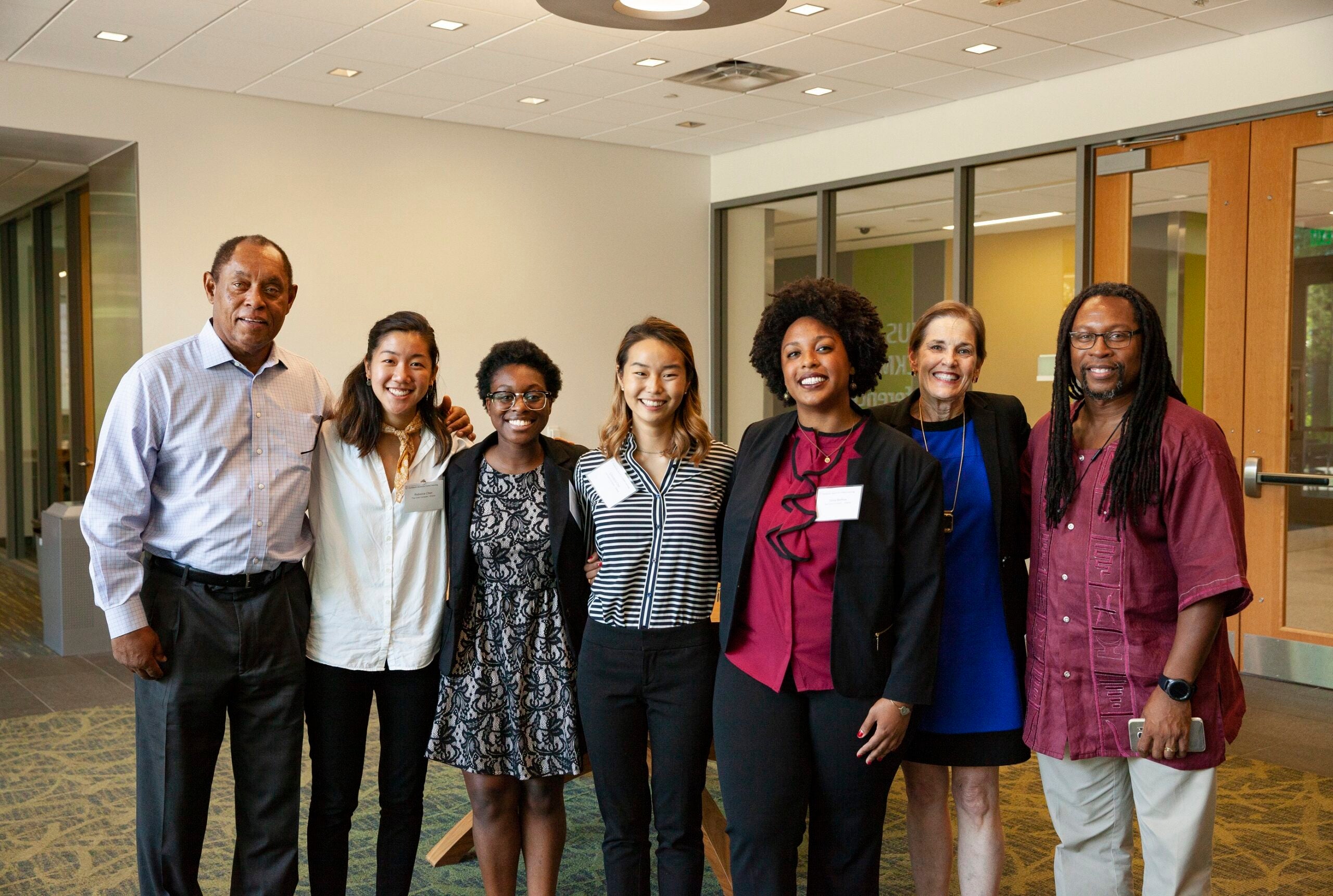 Faculty and students posing